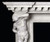 Hercules is depicted on the legs of the marble mantel.
