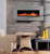 Decorator Gray Limestone facing marks this elegant wall hung electric fireplace.
