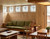 The back wall features a continuous stretch of light-toned, vertical wood paneling that highlights soft grain variations and subtle character knots.
