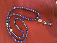 Lapis lazuli Medicine Buddha blue mala with sacred image resting beads, 8mm.