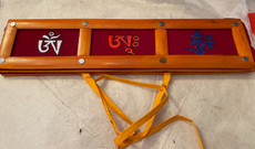 Om Ah Hum Seed Syllable Bamboo, Brocade Text Holder, in the closed position with mantra on top.