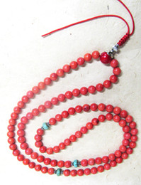 Red Coral Stone Mala made from high-quality 6mm Coral beads, with 3 Turquoise stone resting bead spacers in between sterling silver rings.