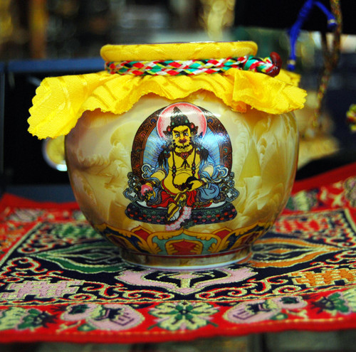 Yellow Dzambhala or Zambala wealth treasure vase