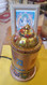 Love and compassion electric prayer wheel with Om Mani Padme Hum and seven other energy balancing mantras.