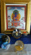 Medicine Buddha on shrine table, the healing Buddha of Compassion.