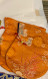 Saffron patterned large mala bag with beautiful designs